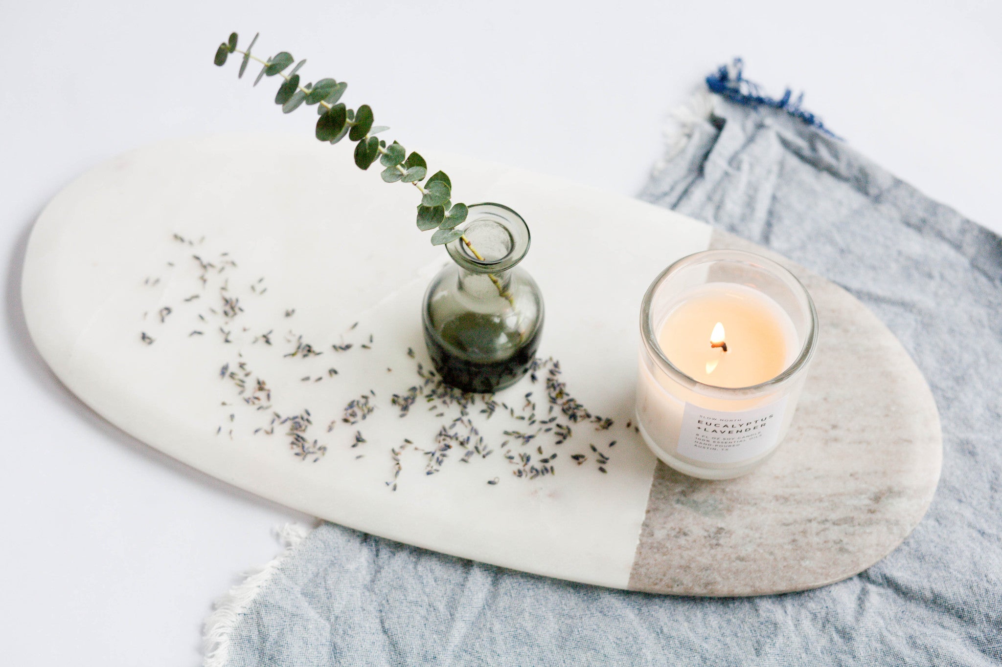 A short history on lavender essential oil and why it's aromatherapy benefits are celebrated worldwide. Slow North uses only essential oils to fragrance its all-natural, soy candles.