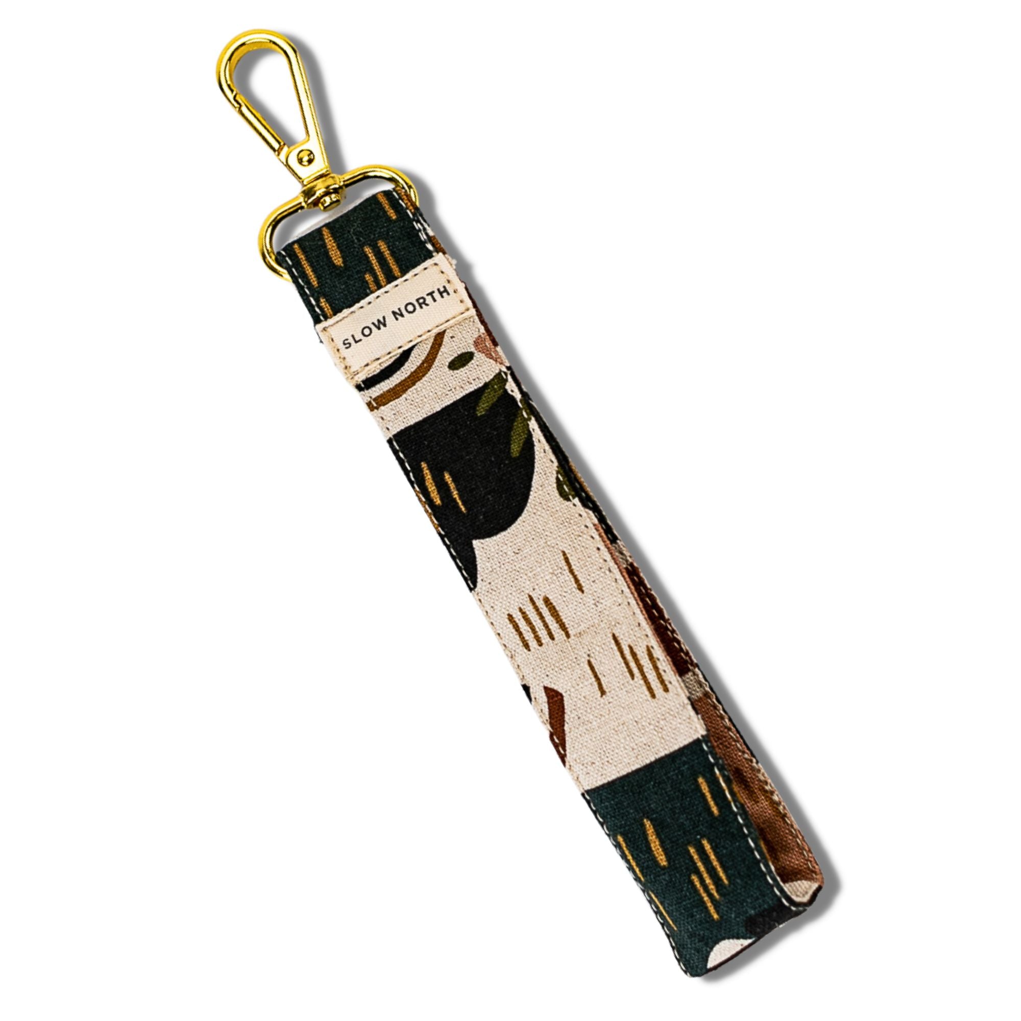 Decorative keychain with geometric pattern on a white background